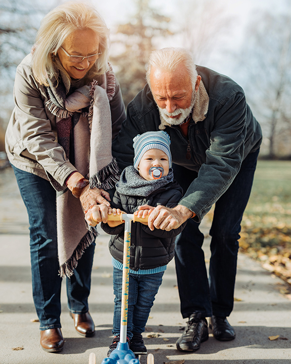 grandparents walking with grand child in city tax deferred annuity faragi group delaware